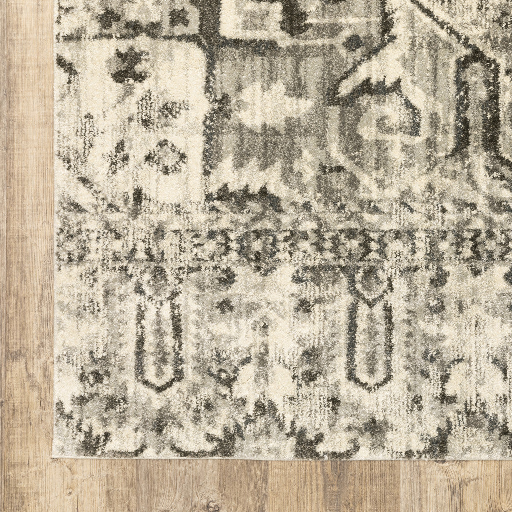 6' X 9' Grey Ivory And Brown Oriental Power Loom Stain Resistant Area Rug