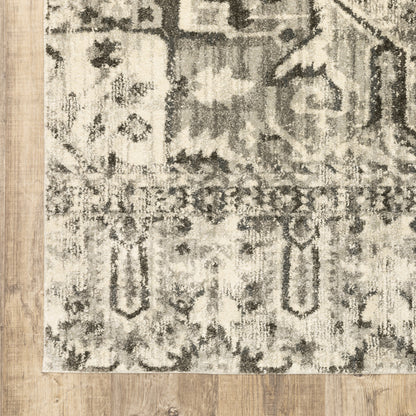 8' X 11' Grey Ivory And Brown Oriental Power Loom Stain Resistant Area Rug