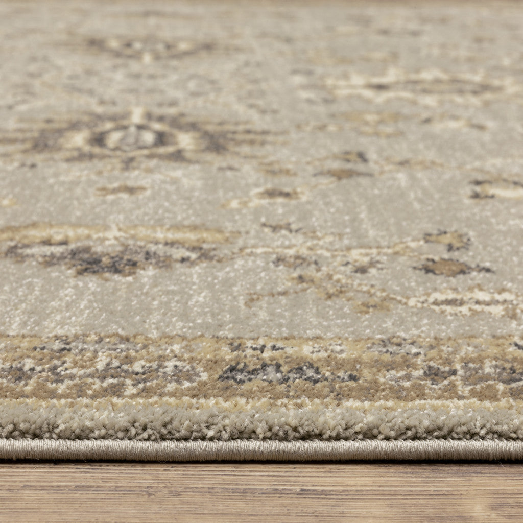 5' X 8' Grey Brown Tan And Beige Oriental Power Loom Stain Resistant Area Rug