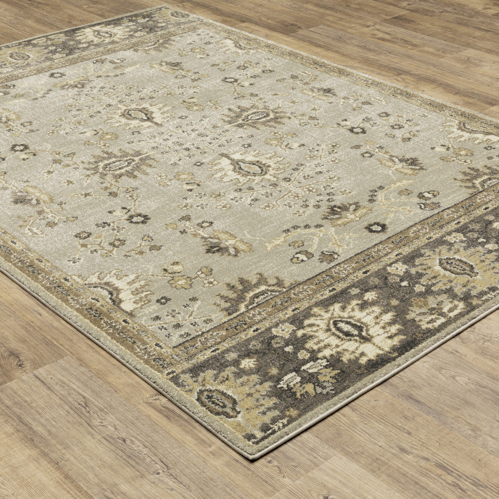 5' X 8' Grey Brown Tan And Beige Oriental Power Loom Stain Resistant Area Rug