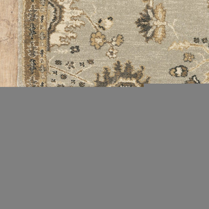 5' X 8' Grey Brown Tan And Beige Oriental Power Loom Stain Resistant Area Rug