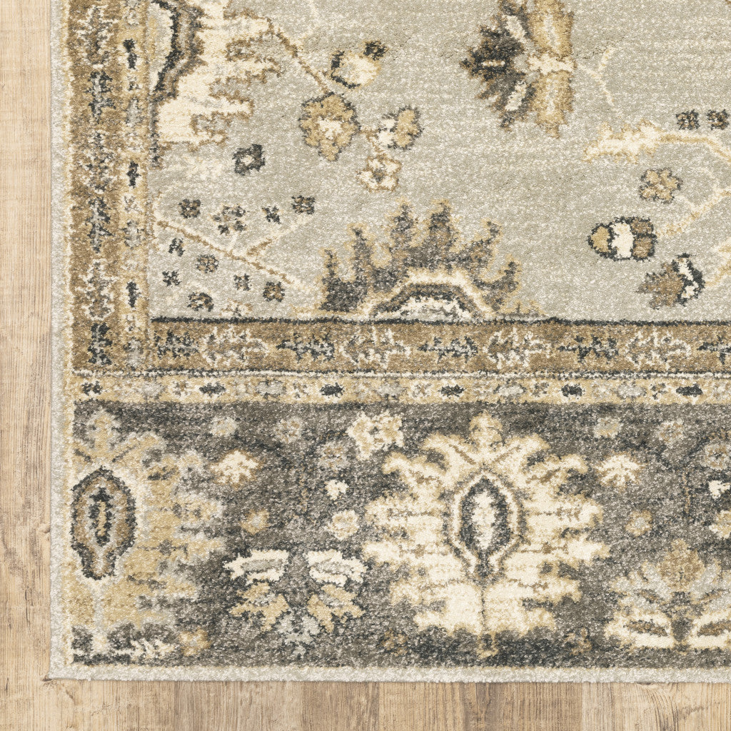 5' X 8' Grey Brown Tan And Beige Oriental Power Loom Stain Resistant Area Rug