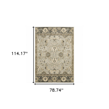 6' X 9' Grey Brown Tan And Beige Oriental Power Loom Stain Resistant Area Rug