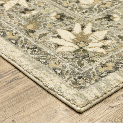 5' X 8' Beige Grey Brown And Charcoal Oriental Power Loom Stain Resistant Area Rug