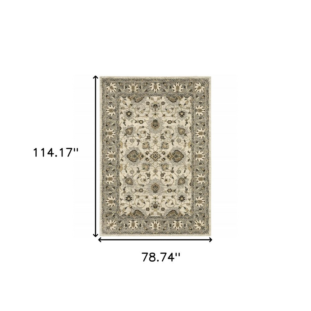 6' X 9' Beige Grey Brown And Charcoal Oriental Power Loom Stain Resistant Area Rug