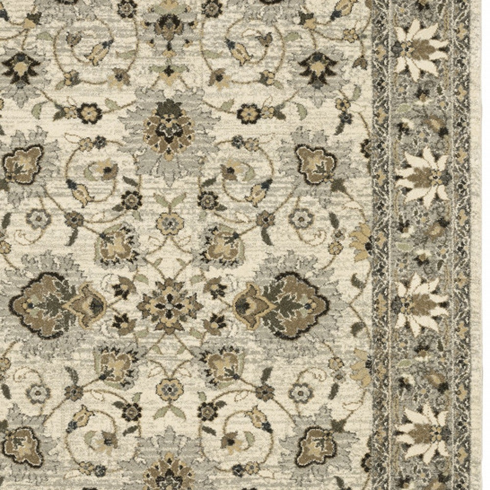 6' X 9' Beige Grey Brown And Charcoal Oriental Power Loom Stain Resistant Area Rug