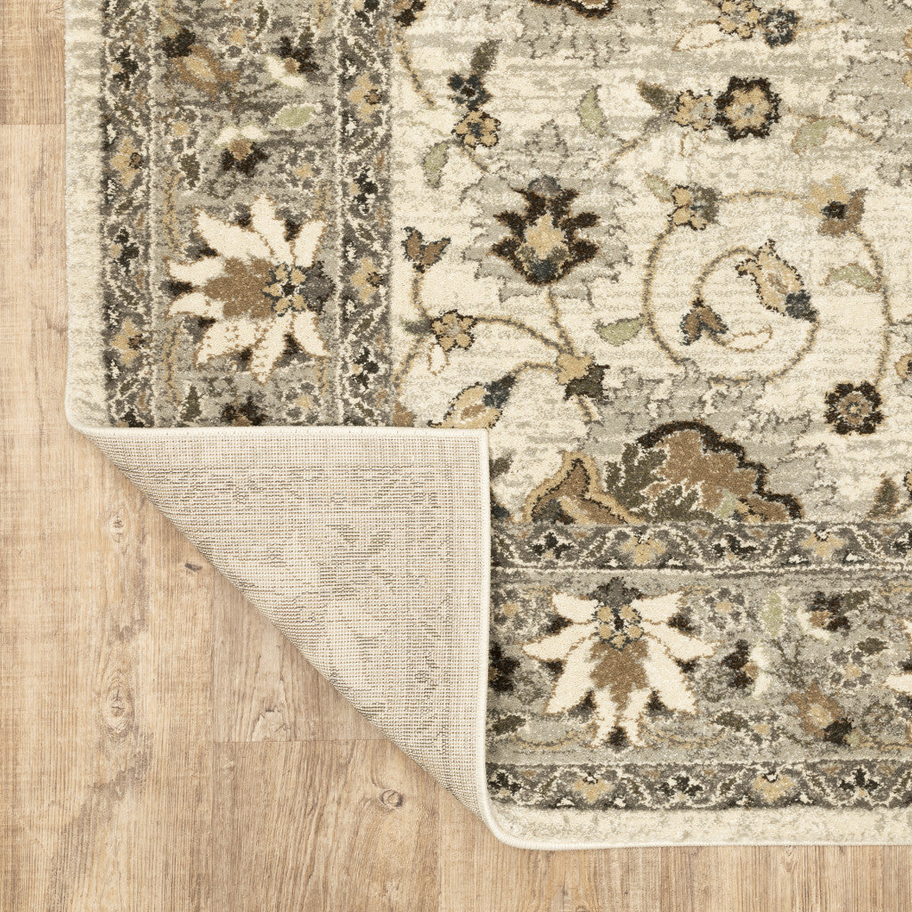 6' X 9' Beige Grey Brown And Charcoal Oriental Power Loom Stain Resistant Area Rug