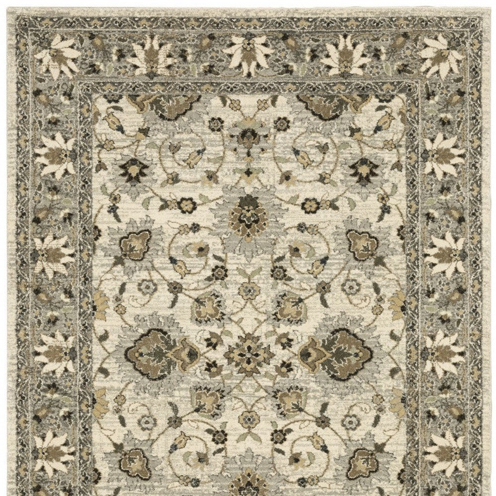 8' X 11' Beige Grey Brown And Charcoal Oriental Power Loom Stain Resistant Area Rug