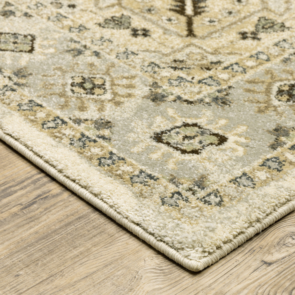 5' X 8' Beige Grey Tan And Brown Oriental Power Loom Stain Resistant Area Rug