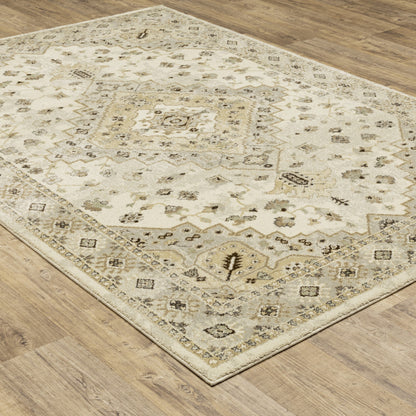 5' X 8' Beige Grey Tan And Brown Oriental Power Loom Stain Resistant Area Rug