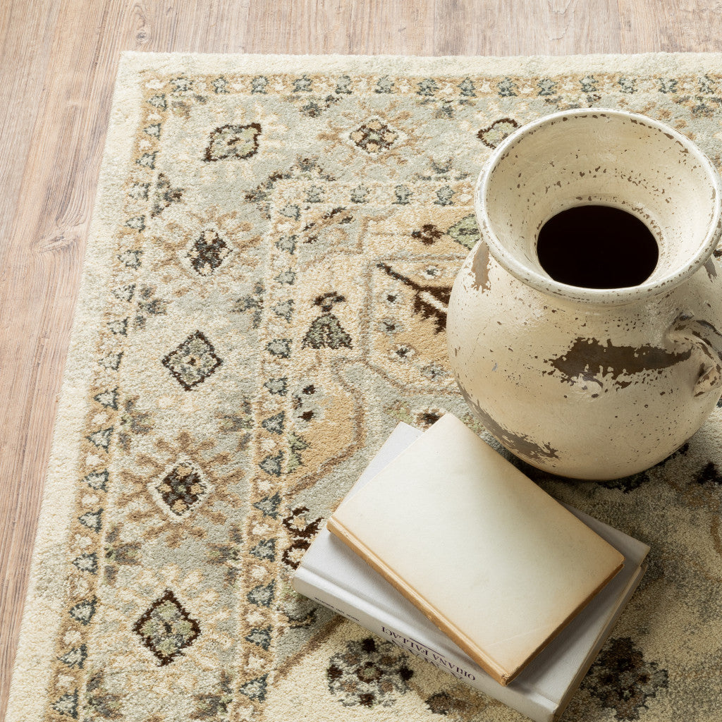 5' X 8' Beige Grey Tan And Brown Oriental Power Loom Stain Resistant Area Rug