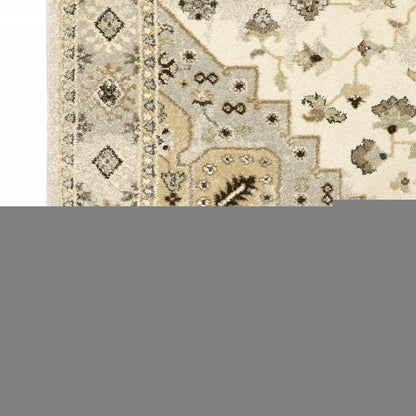 5' X 8' Beige Grey Tan And Brown Oriental Power Loom Stain Resistant Area Rug