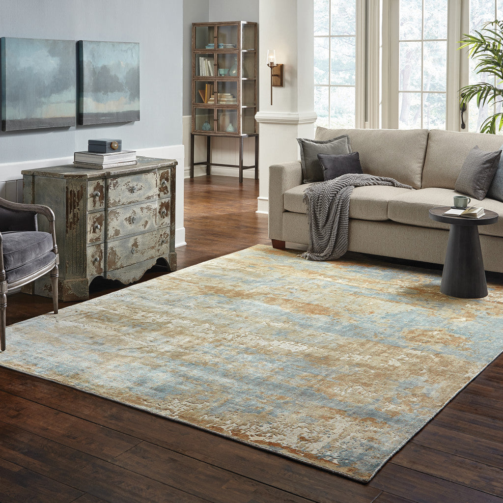 6' X 9' Blue And Brown Abstract Hand Loomed Stain Resistant Area Rug