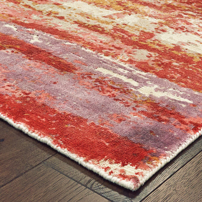 2' X 10' Pink And Red Abstract Hand Loomed Stain Resistant Runner Rug