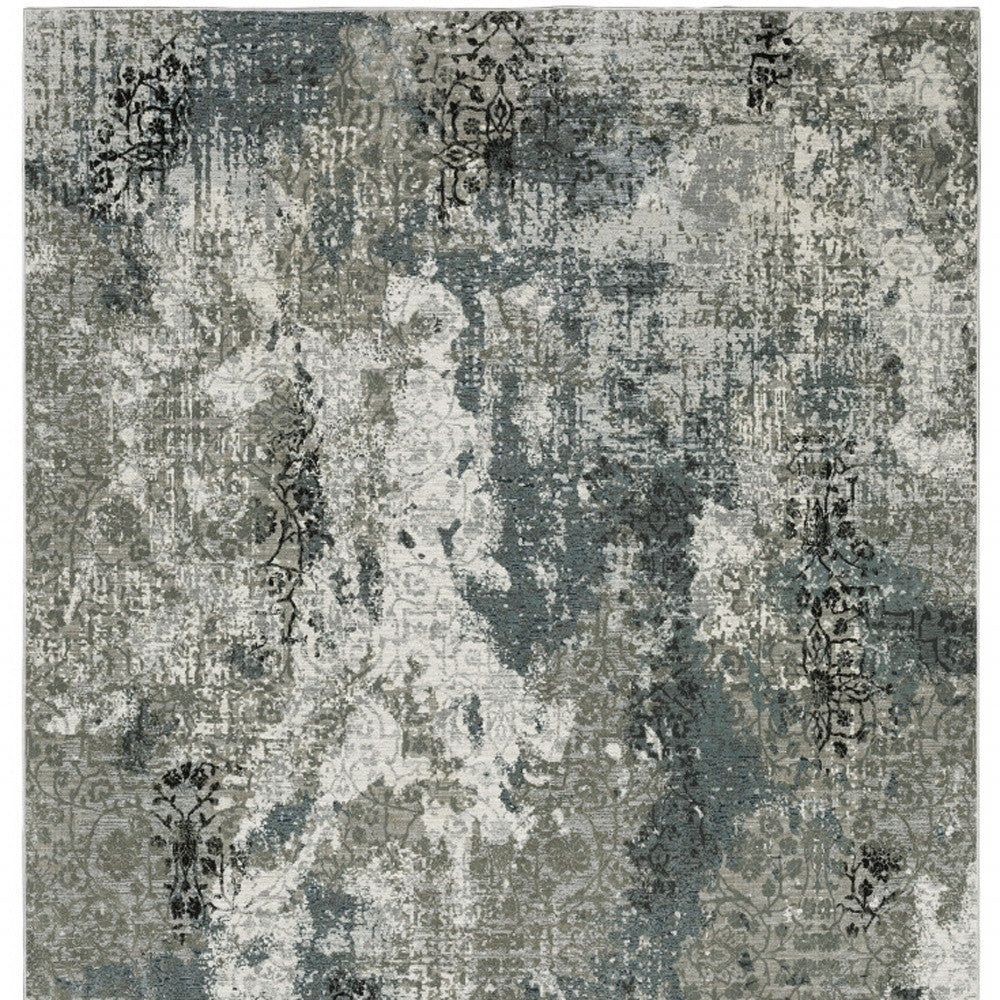 10' X 13' Ivory Grey Charcoal Blue And Navy Abstract Power Loom Stain Resistant Area Rug