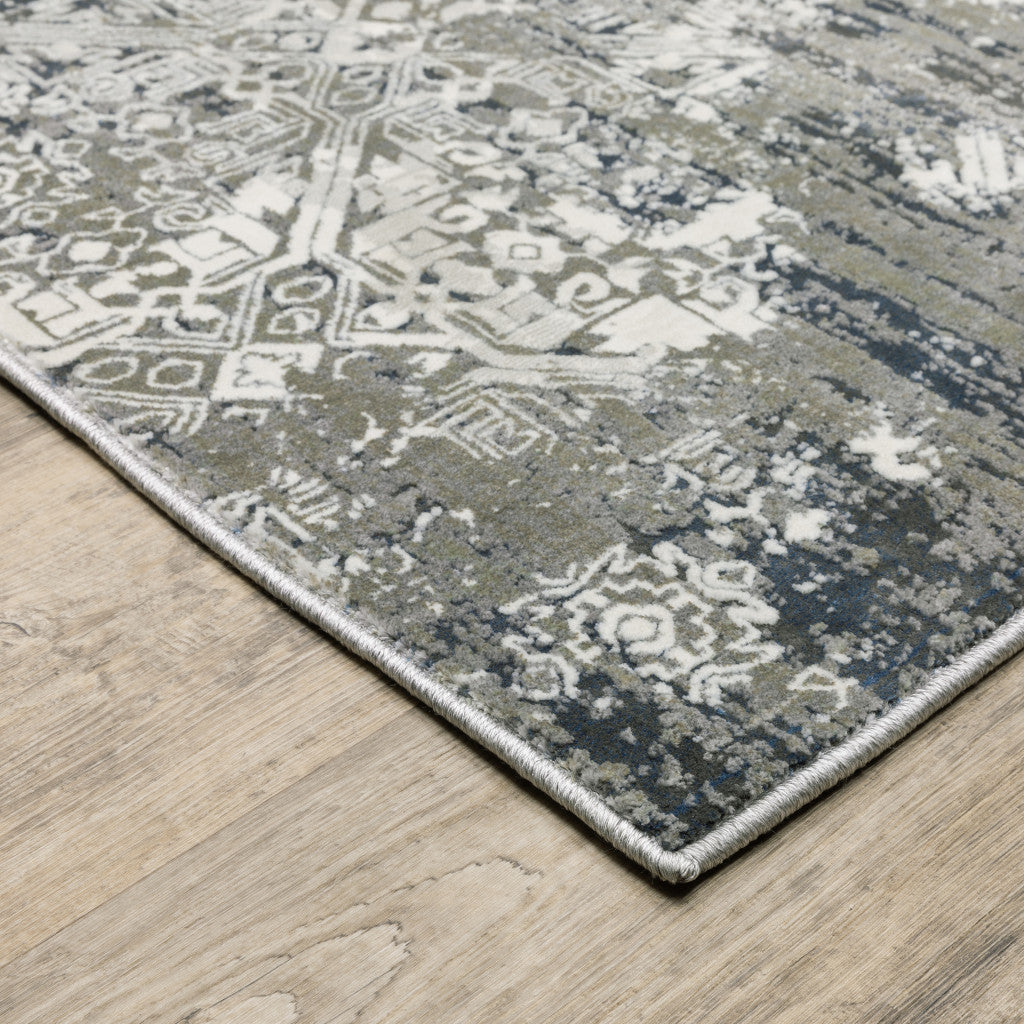 6' X 9' Ivory Grey Blue And Taupe Abstract Power Loom Stain Resistant Area Rug