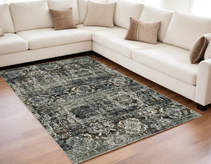 5' X 8' Ivory Charcoal Grey Blue Rust Gold And Brown Oriental Power Loom Stain Resistant Area Rug