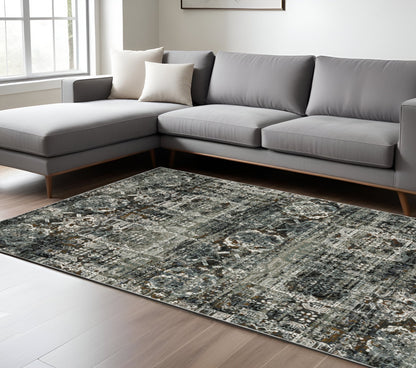 6' X 9' Ivory Charcoal Grey Blue Rust Gold And Brown Oriental Power Loom Stain Resistant Area Rug