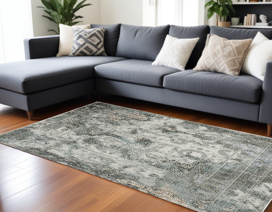 8' X 11' Ivory Grey Charcoal Blue And Rust Oriental Power Loom Stain Resistant Area Rug