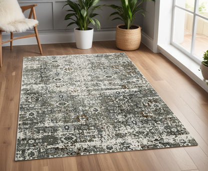 4' X 6' Ivory Grey Charcoal Rust Gold And Brown Oriental Power Loom Stain Resistant Area Rug