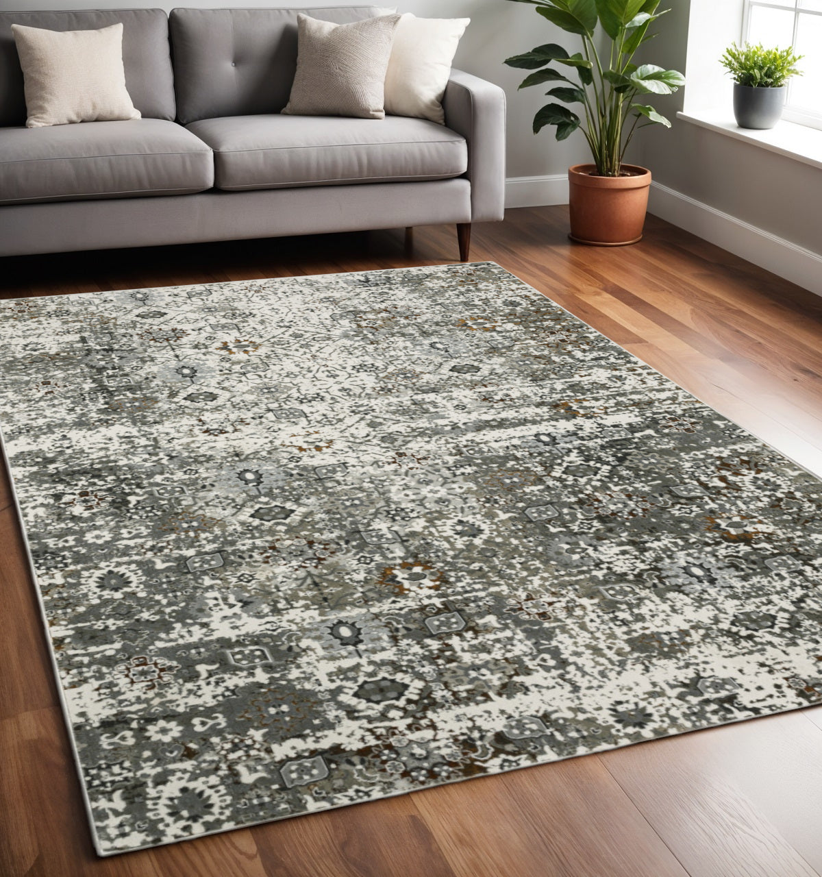 5' X 8' Ivory Grey Charcoal Rust Gold And Brown Oriental Power Loom Stain Resistant Area Rug