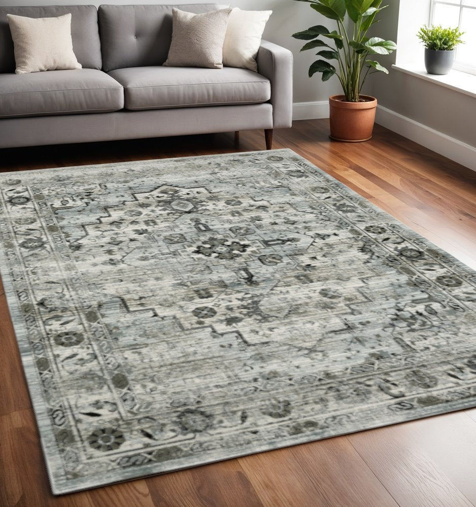 5' X 8' Ivory Grey Charcoal Blue And Taupe Oriental Power Loom Stain Resistant Area Rug