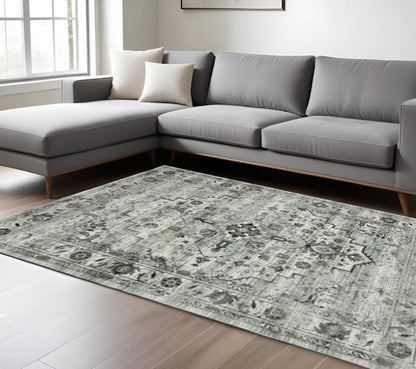 6' X 9' Ivory Grey Charcoal Blue And Taupe Oriental Power Loom Stain Resistant Area Rug