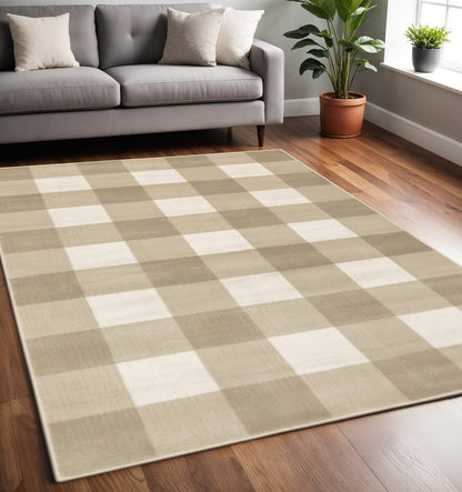 5' X 7' Beige And Ivory Geometric Power Loom Stain Resistant Area Rug