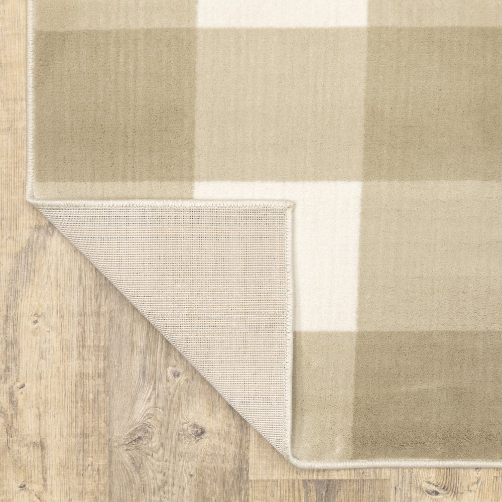 7' X 9' Beige And Ivory Geometric Area Rug
