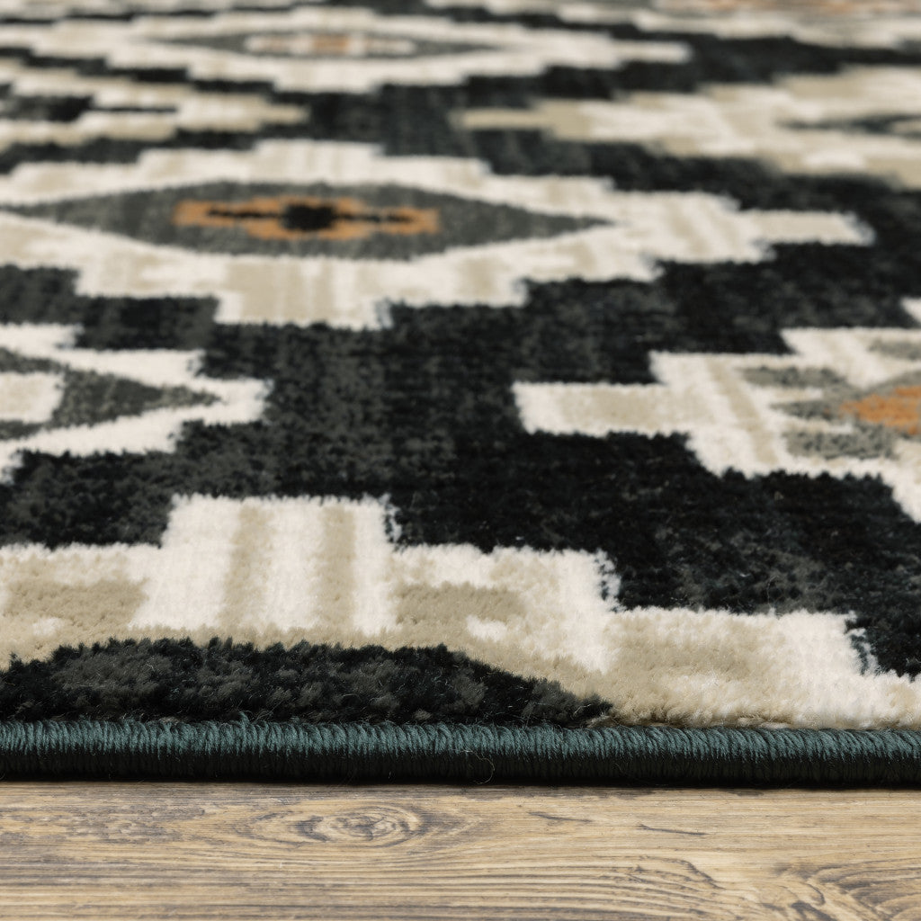 2' X 8' Black Grey Tan Orange And Ivory Southwestern Power Loom Stain Resistant Runner Rug