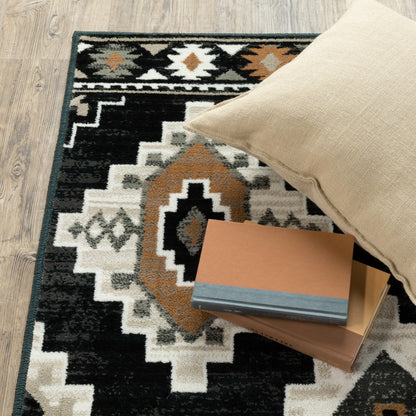 2' X 8' Black Grey Tan Orange And Ivory Southwestern Power Loom Stain Resistant Runner Rug