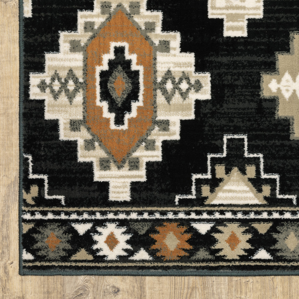 2' X 8' Black Grey Tan Orange And Ivory Southwestern Power Loom Stain Resistant Runner Rug