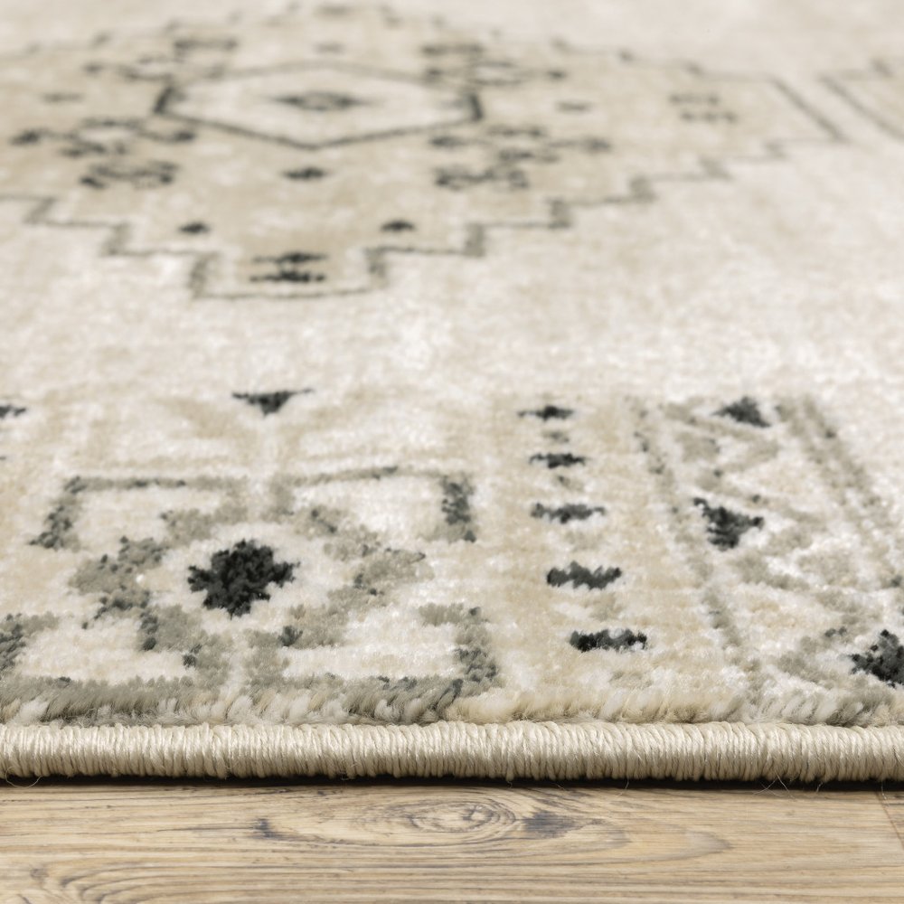 7' X 9' Gray And Ivory Southwestern Area Rug