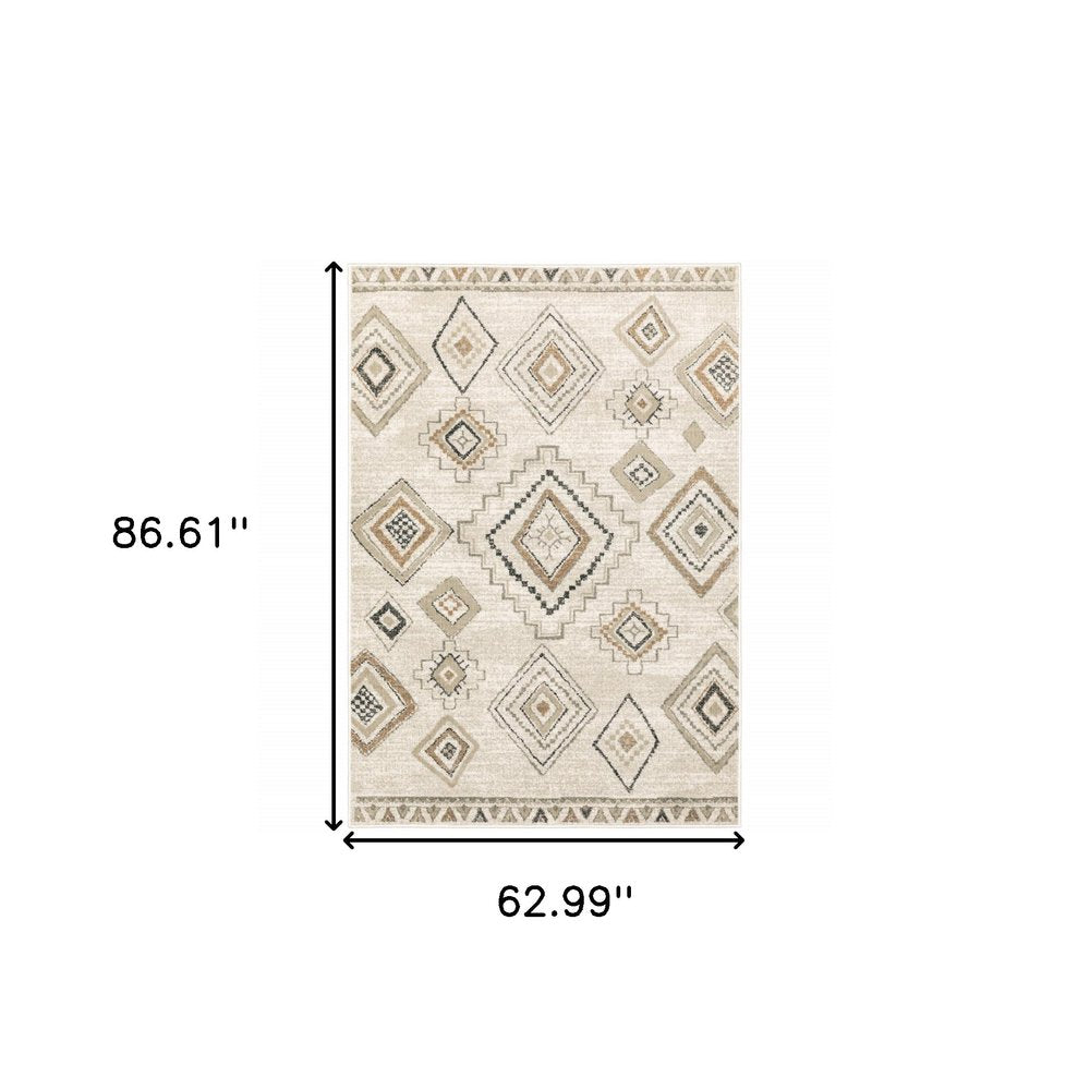 5' X 7' Ivory Orange Tan Black And Grey Southwestern Power Loom Stain Resistant Area Rug