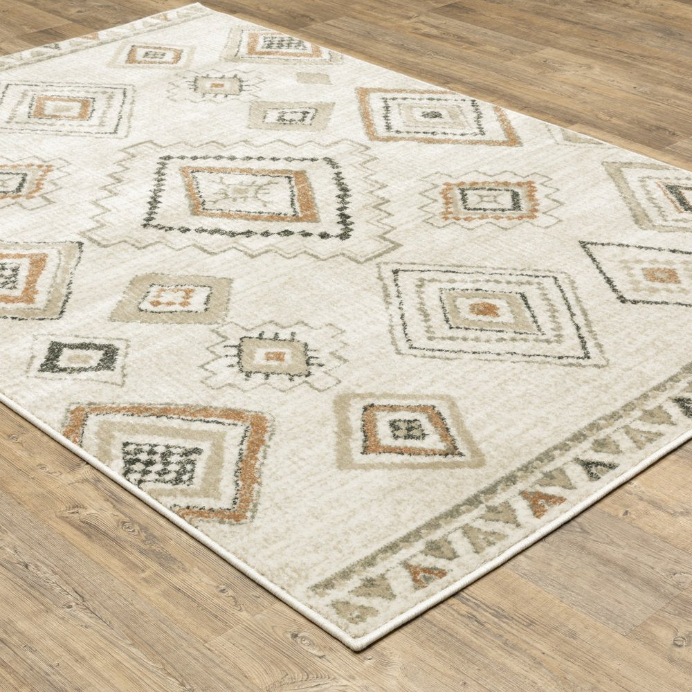7' X 9' Orange And Ivory Southwestern Area Rug