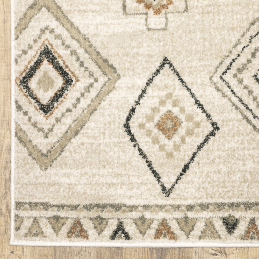 7' X 9' Orange And Ivory Southwestern Area Rug