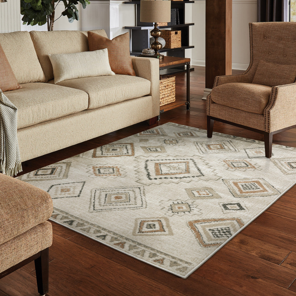 8' X 10' Ivory Orange Tan Black And Grey Southwestern Power Loom Stain Resistant Area Rug