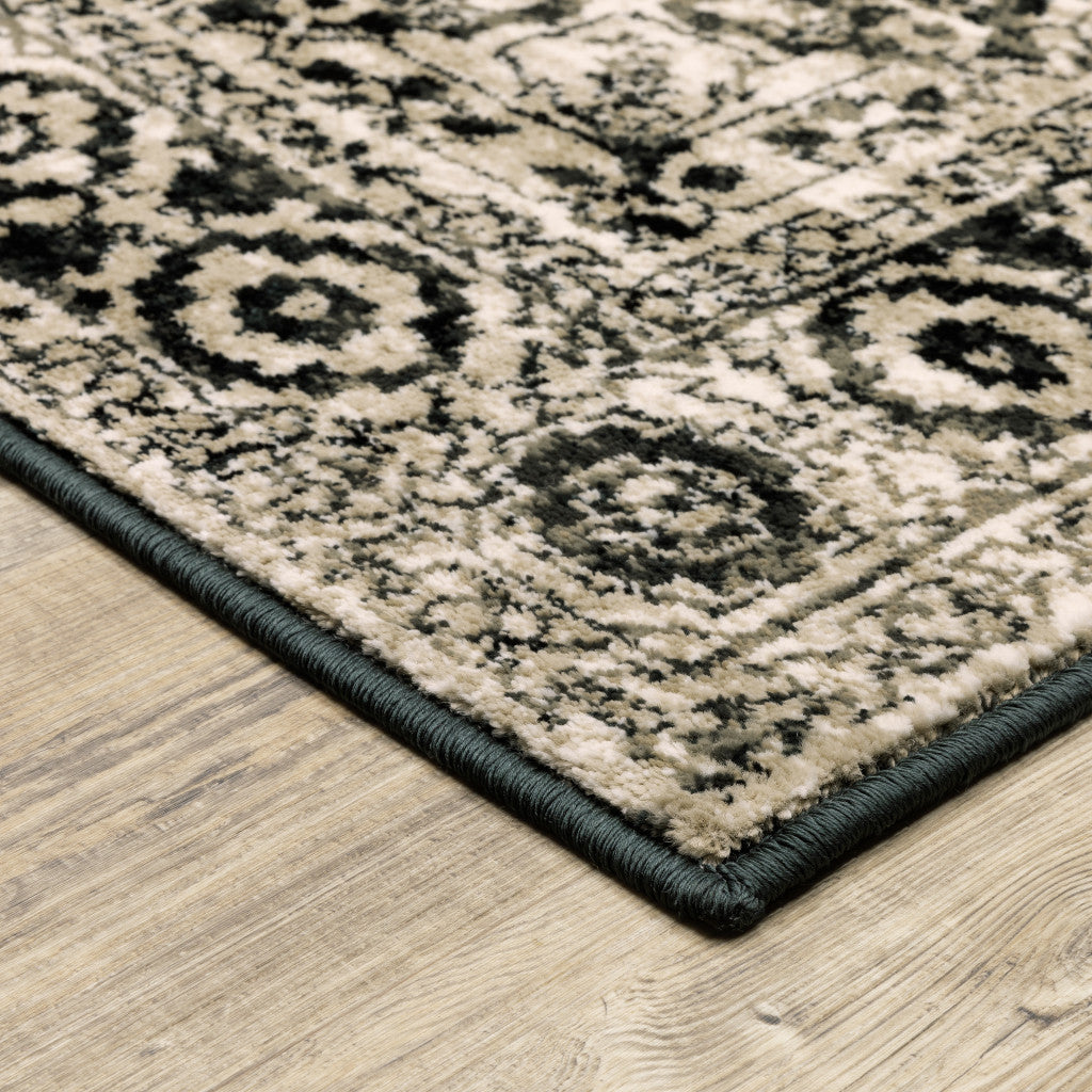 4' X 6' Black Grey Tan And Ivory Oriental Power Loom Stain Resistant Area Rug