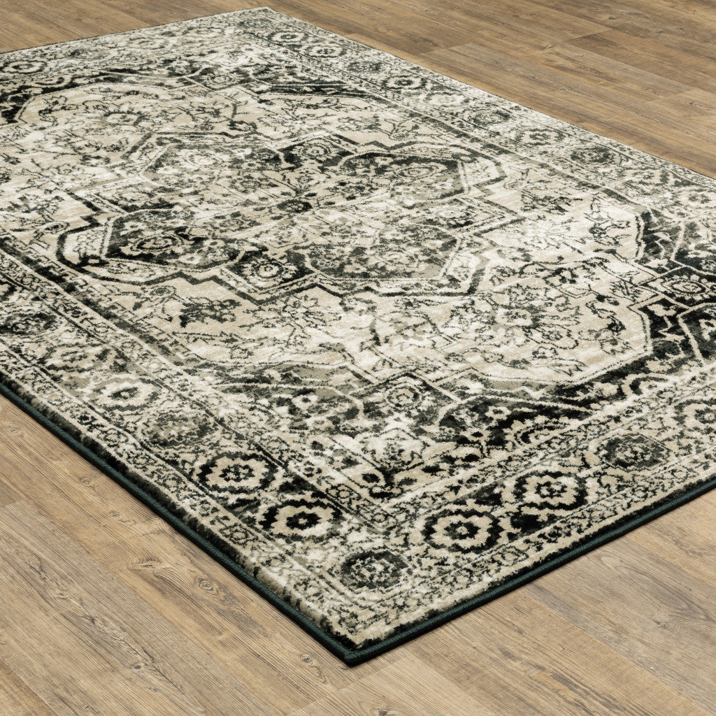 4' X 6' Black Grey Tan And Ivory Oriental Power Loom Stain Resistant Area Rug