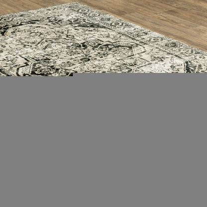 4' X 6' Black Grey Tan And Ivory Oriental Power Loom Stain Resistant Area Rug