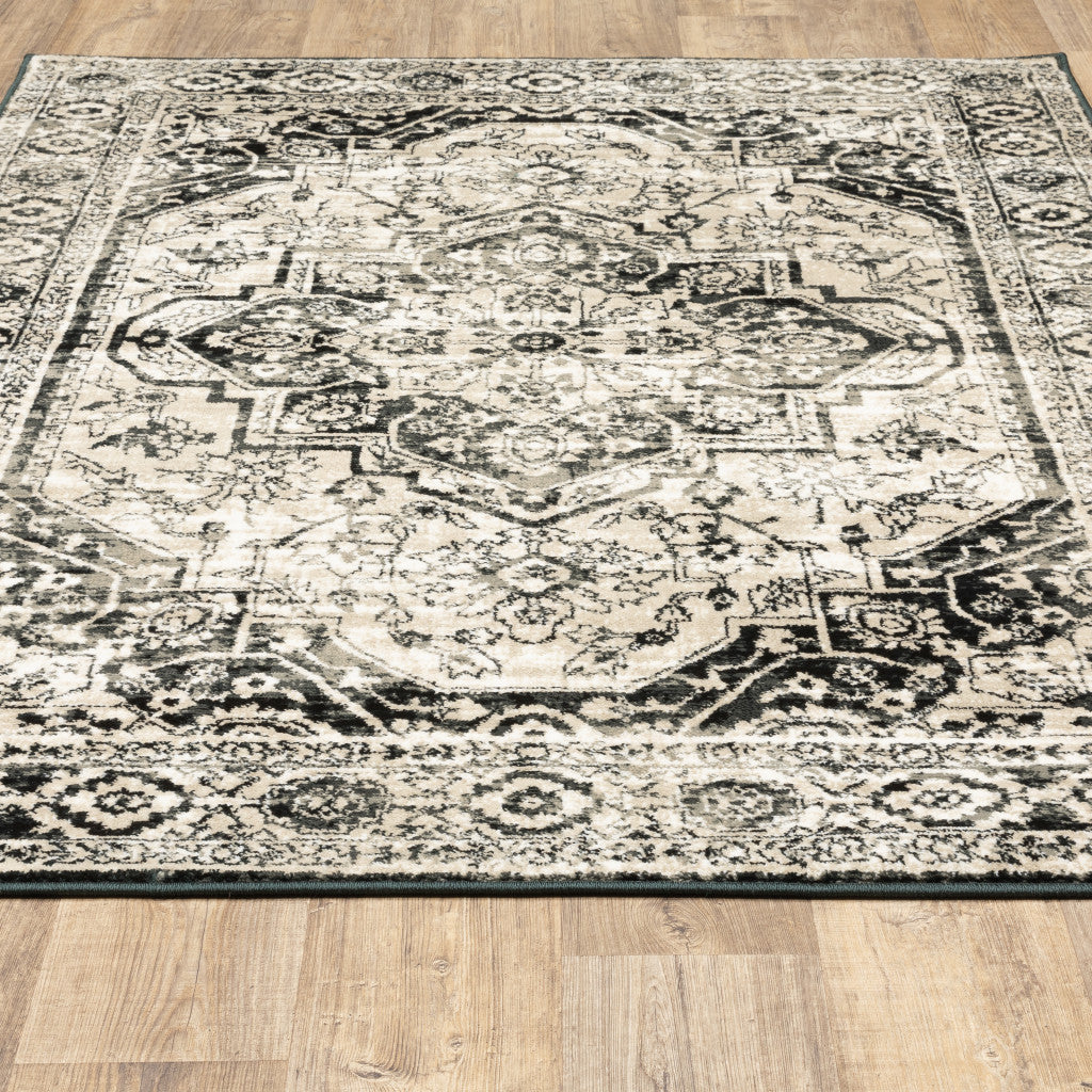 4' X 6' Black Grey Tan And Ivory Oriental Power Loom Stain Resistant Area Rug