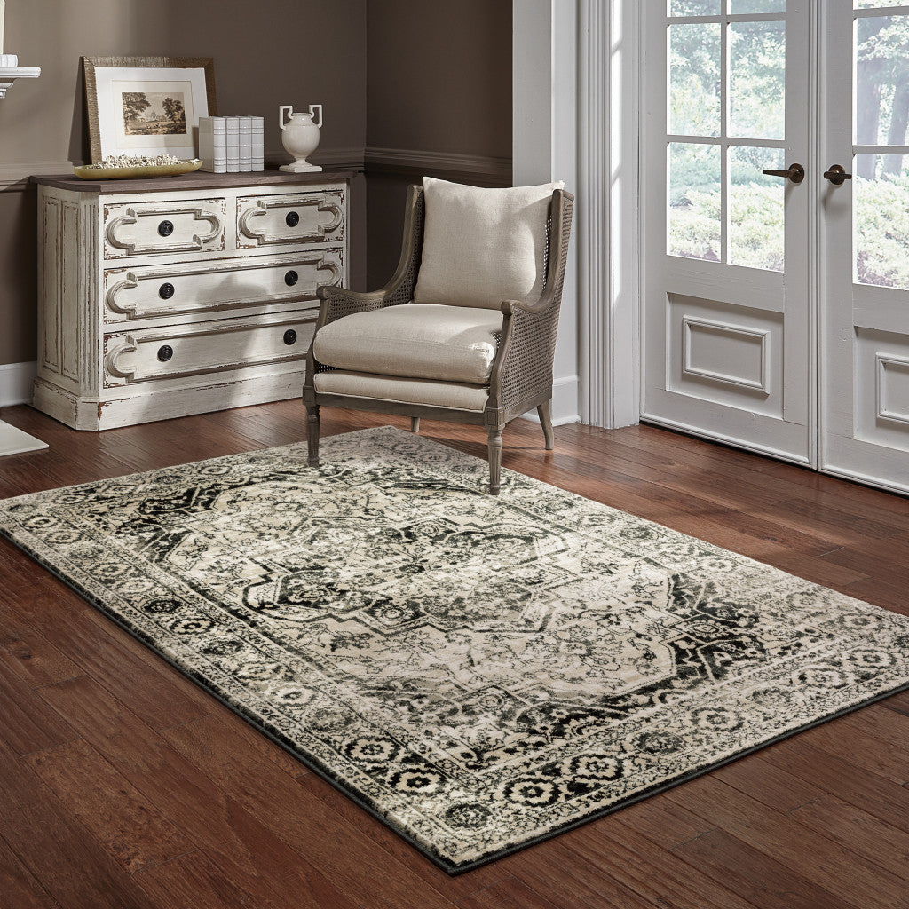 8' X 10' Black Grey Tan And Ivory Oriental Power Loom Stain Resistant Area Rug