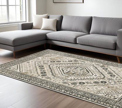 10' X 13' Ivory Grey Black And Ivory Oriental Power Loom Stain Resistant Area Rug