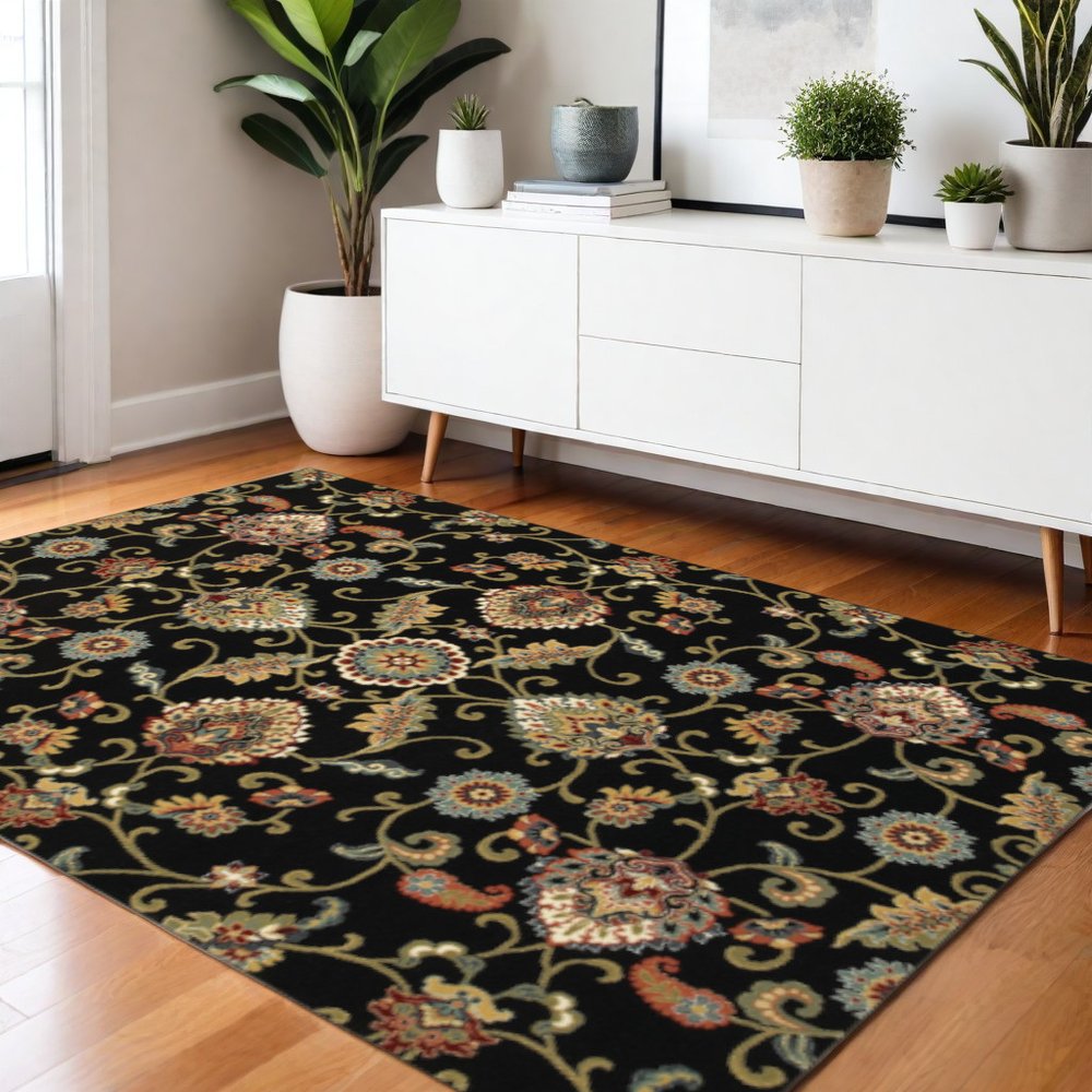 4' X 6' Black Red Green Ivory Salmon And Yellow Floral Power Loom Stain Resistant Area Rug