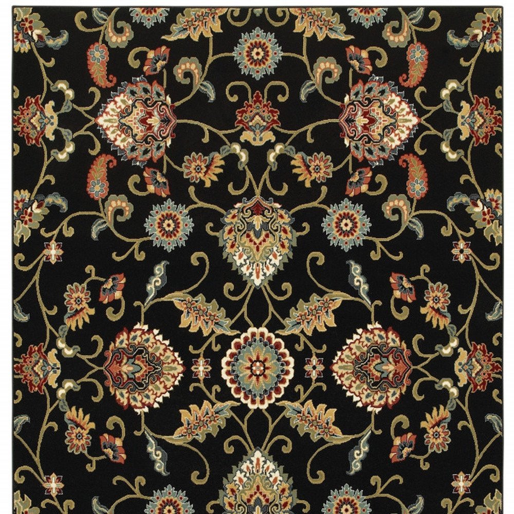 5' X 8' Black Red Green Ivory Salmon And Yellow Floral Power Loom Stain Resistant Area Rug
