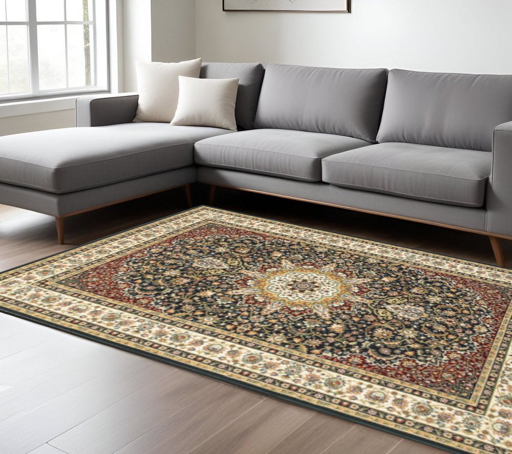 6' X 9' Navy And Ivory Oriental Power Loom Stain Resistant Area Rug