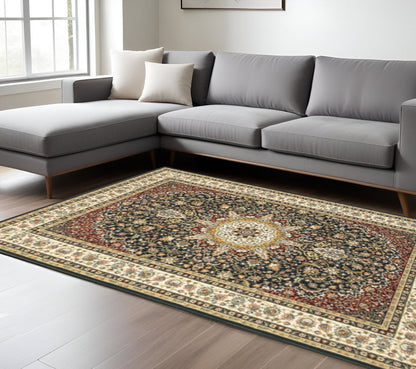 6' X 9' Navy And Ivory Oriental Power Loom Stain Resistant Area Rug