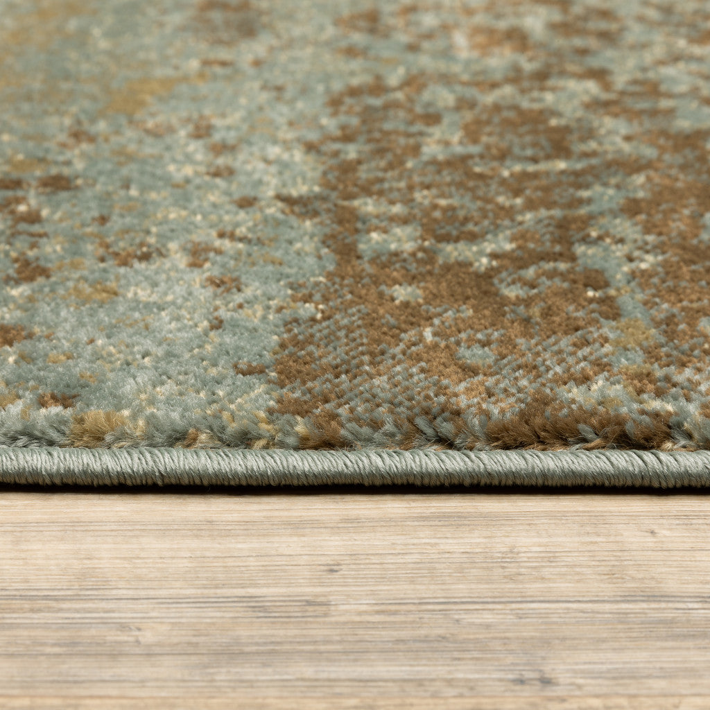 5' X 7' Teal Blue Brown Green And Beige Abstract Power Loom Stain Resistant Area Rug