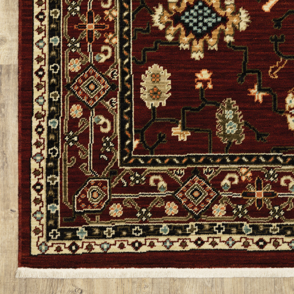 2' X 3' Red Black Ivory And Brown Oriental Power Loom Stain Resistant Area Rug With Fringe