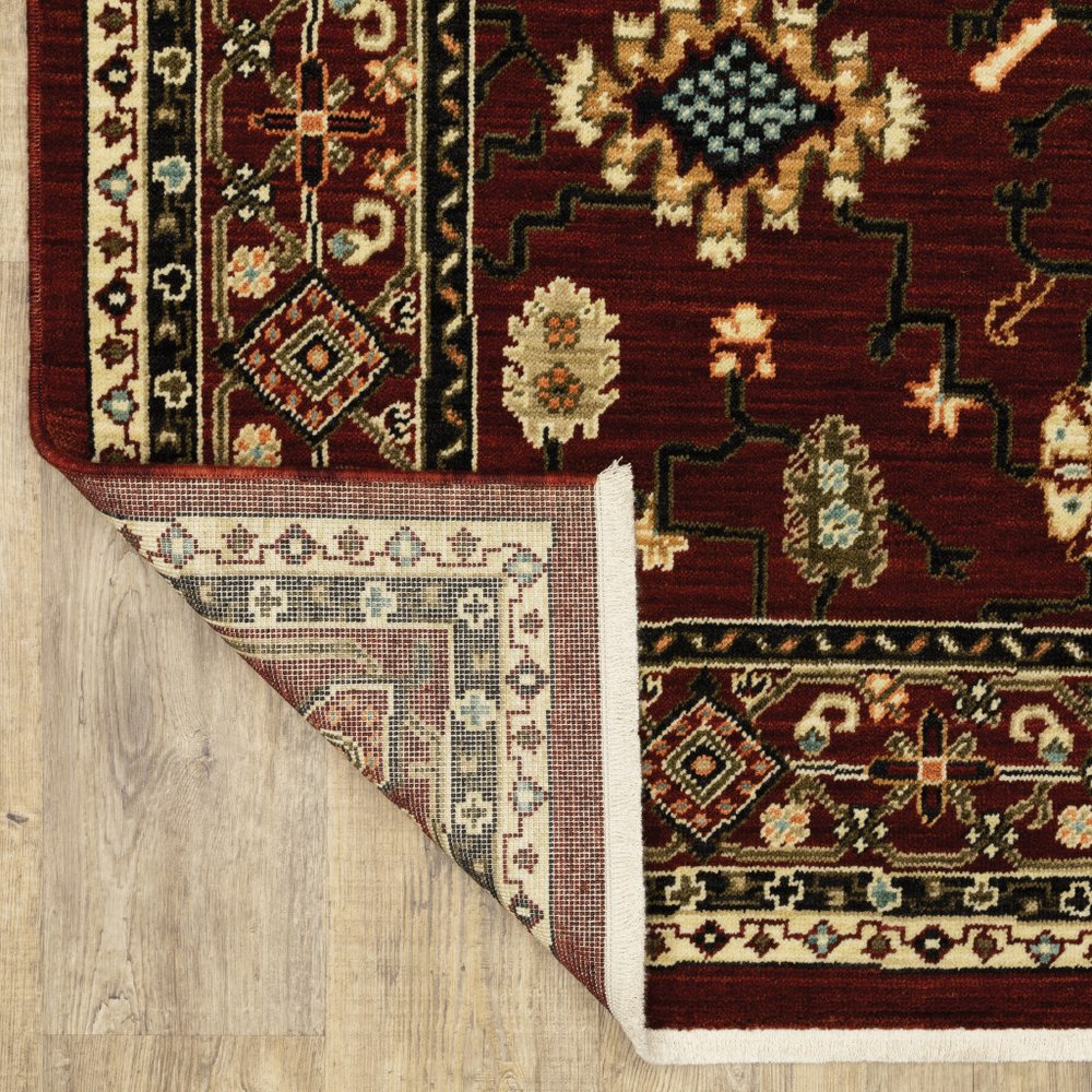 3' X 5' Red Black Ivory And Brown Oriental Power Loom Stain Resistant Area Rug With Fringe